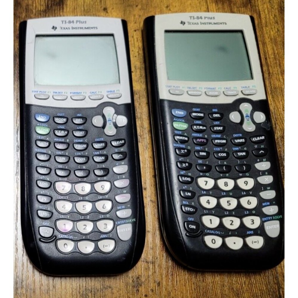 Lot of 2 Texas Instruments TI-83 Plus Graphing Calculators For Parts Or Repair